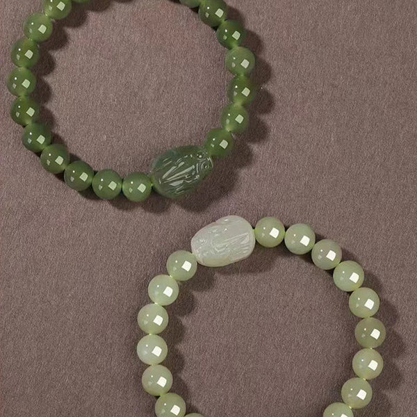 Hetian Jade PiXiu Bracelet – two bracelets, light and dark green jade with PiXiu, comparison shot