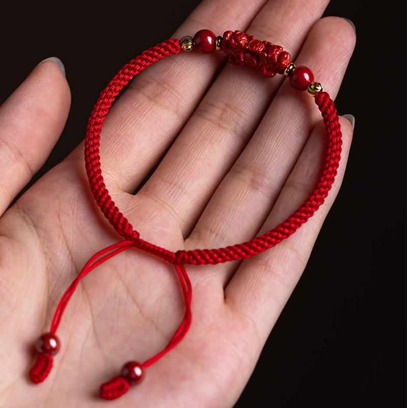 Cinnabar Ruyi Fu PiXiu Red Bracelet – PiXiu bracelet in woman's palm showing full design, lucky charm gift