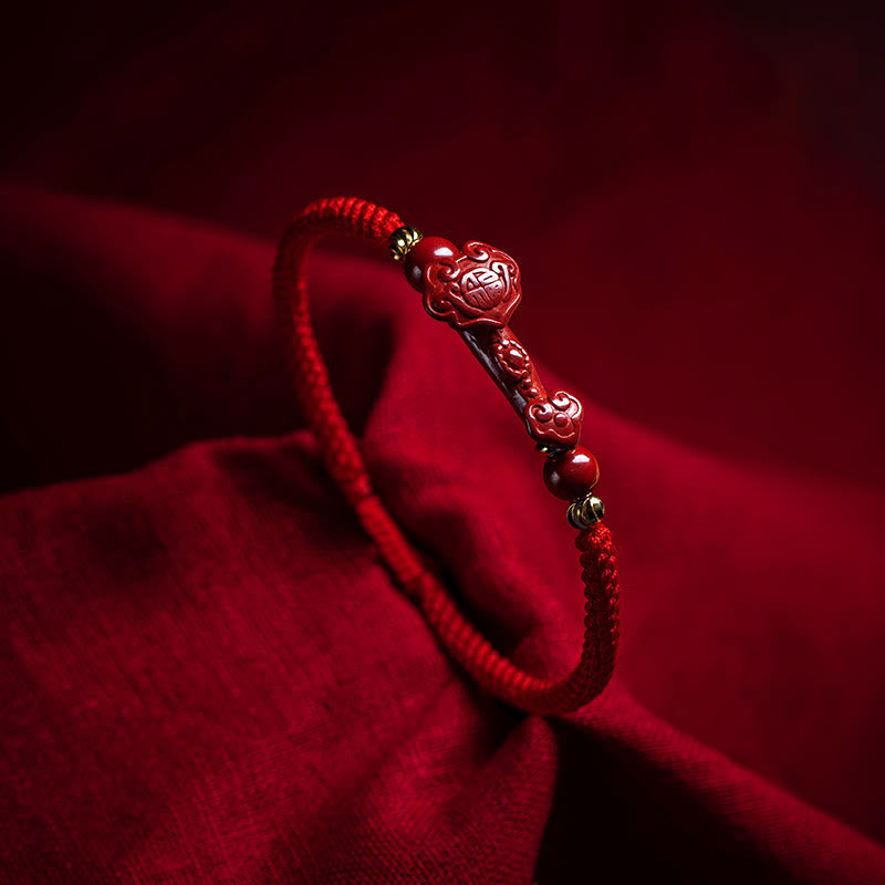 Cinnabar Ruyi Fu PiXiu Red Bracelet – single cinnabar Ruyi bracelet on red silk fabric, dramatic lighting, spiritual jewelry