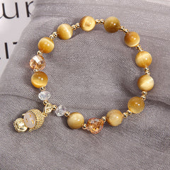 Yellow Tiger Eye Meditation Buddha Bracelet – Buddha head charm front view, oxidized metal detail