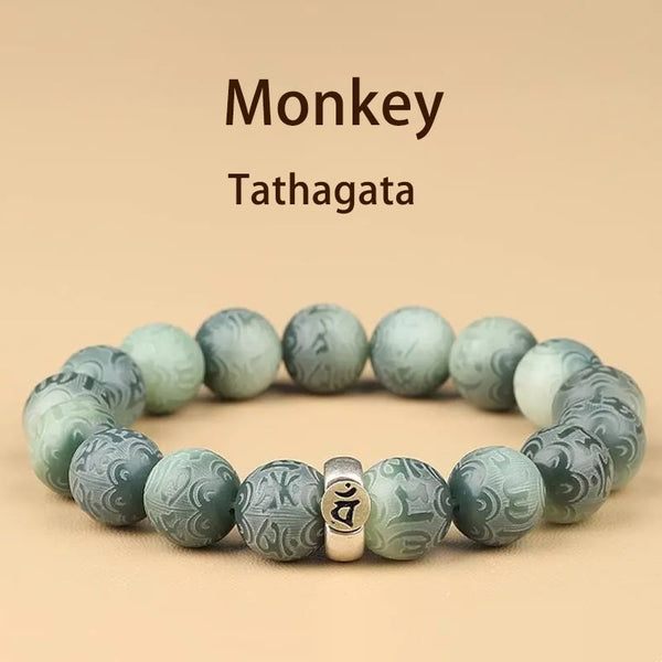 Chinese Zodiac Wisdom Bracelet – Muted green carved mantra beads with Sanskrit seed syllable charm