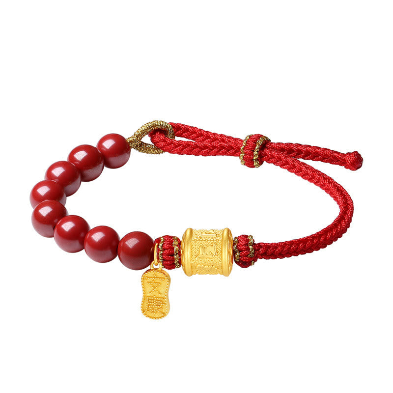 Sterling Silver Cinnabar Bracelet – White background shot of red beads and gold charm, buddhist blessing bracelet
