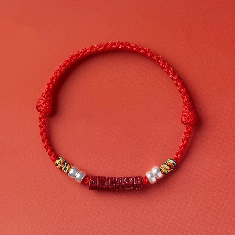 Cinnabar Om Mani Padme Hum Red String Bracelet – braided red cord with cinnabar mantra charm, unisex
