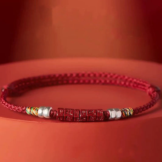 Cinnabar Om Mani Padme Hum Red String Bracelet – side view showing engraved cinnabar beads, spiritual jewelry