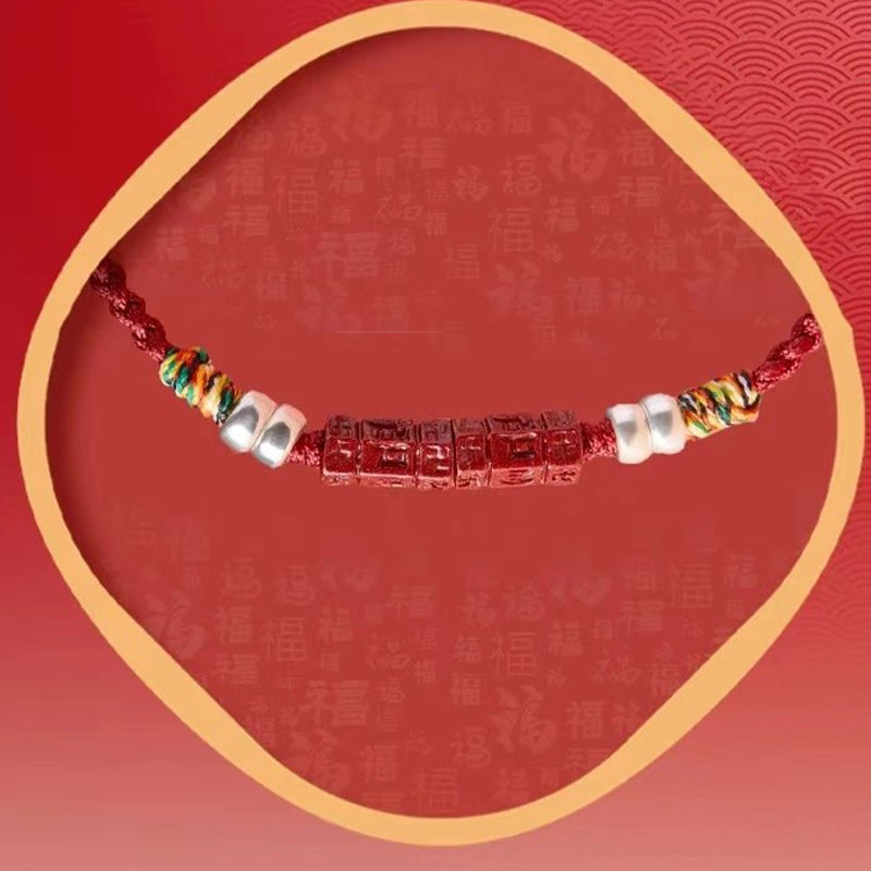 Cinnabar Om Mani Padme Hum Red String Bracelet – oval framed display with festive red pattern, gift