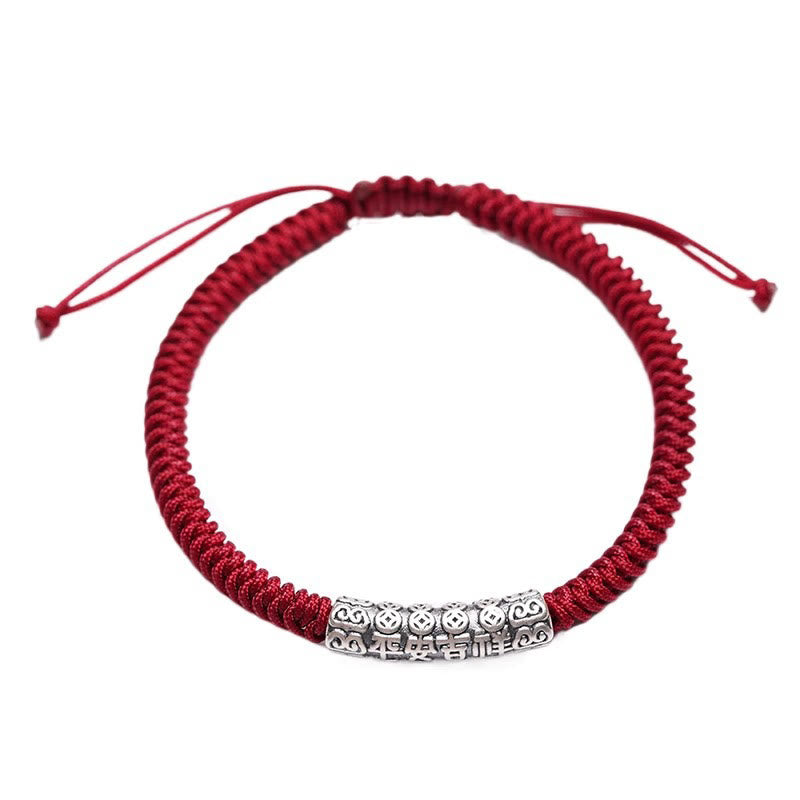 Silver Mantra Rope Bracelet – White background shot of red cord with six-section silver bead, unisex bracelet