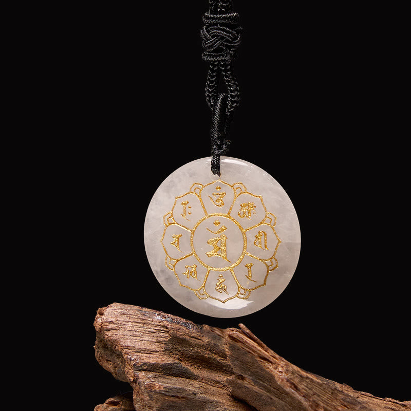 Om Mani Padme Hum Necklace – White quartz pendant with gold mantra on dark backdrop, crystal healing necklace