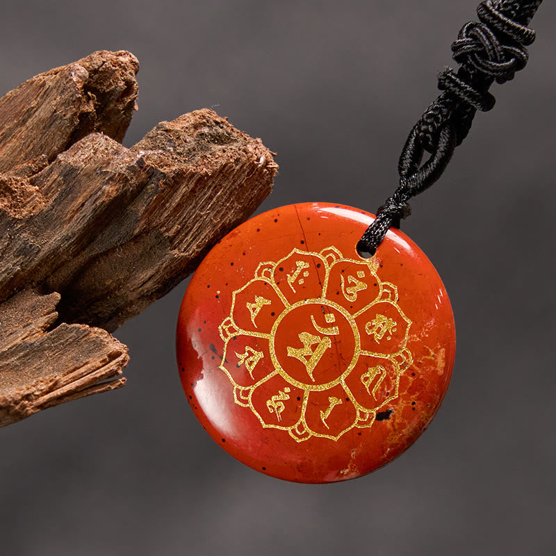 Om Mani Padme Hum Necklace – Red jasper with gold Sanskrit and wood prop on dark, Buddhist amulet jewelry
