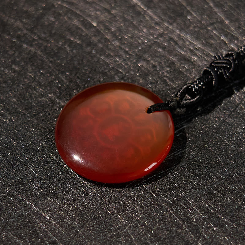 Om Mani Padme Hum Necklace – Carnelian on black leather with gold lotus, translucent agate necklace