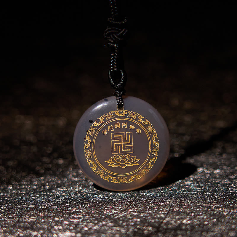 Smoky Agate Purification Pendant - pale gray translucent stone gold swastika & lotus, dark metallic bg, ethereal