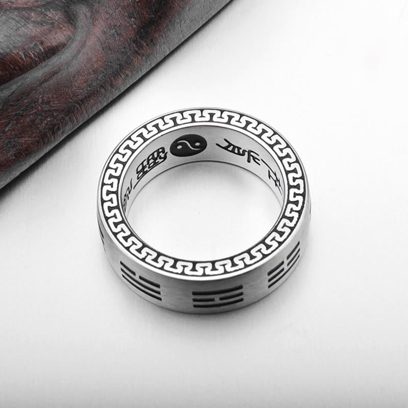 Bagua Ring - Flat white background shot of trigram engraved band with inner yin-yang symbol