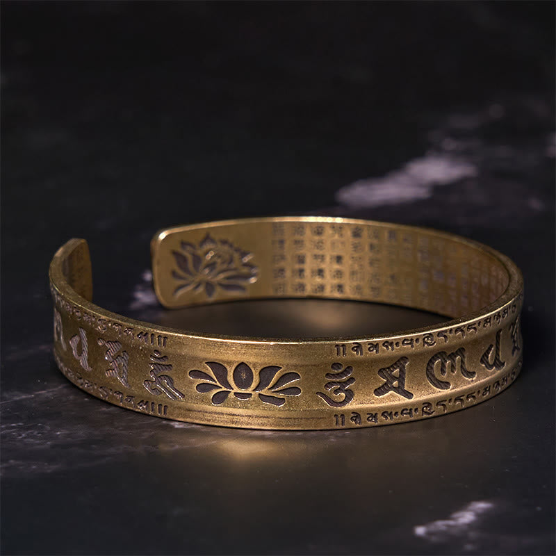 Heart Sutra Lotus Cuff Bracelet - Om mantra exterior with inner lotus engraving, spiritual