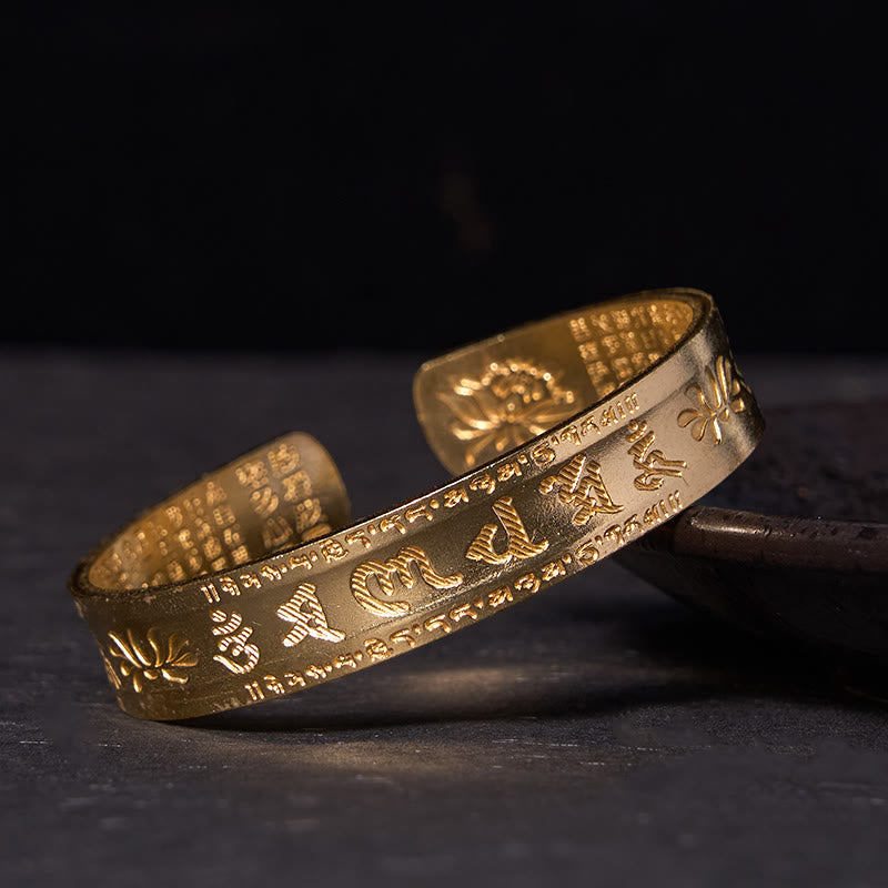 Om Mani Padme Hum Cuff Bracelet - gold-tone mantra band on black marble, grounding