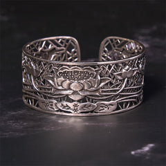 Hollow Lotus Silver Plated Copper Bracelet Bangle – antique silver lotus bloom on charcoal slate, wellness