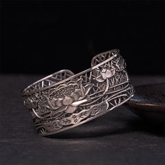 Hollow Lotus Silver Plated Copper Bracelet Bangle – oxidized silver lotus filigree on dark stone, healing balance
