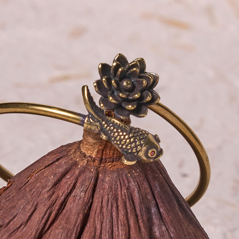 Lotus Koi Fish Copper Brass Luck Bangle – koi and lotus finial mounted on dried lotus pod base, close-up macro