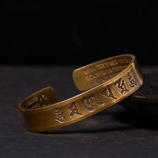 Om Mani Padme Hum Copper Cuff Bangle – Antiqued copper with Tibetan mantra on dark stone, spiritual jewelry