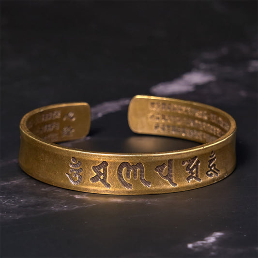 Om Mani Padme Hum Copper Cuff Bangle – Golden embossed script on black marble, engraved copper bangle