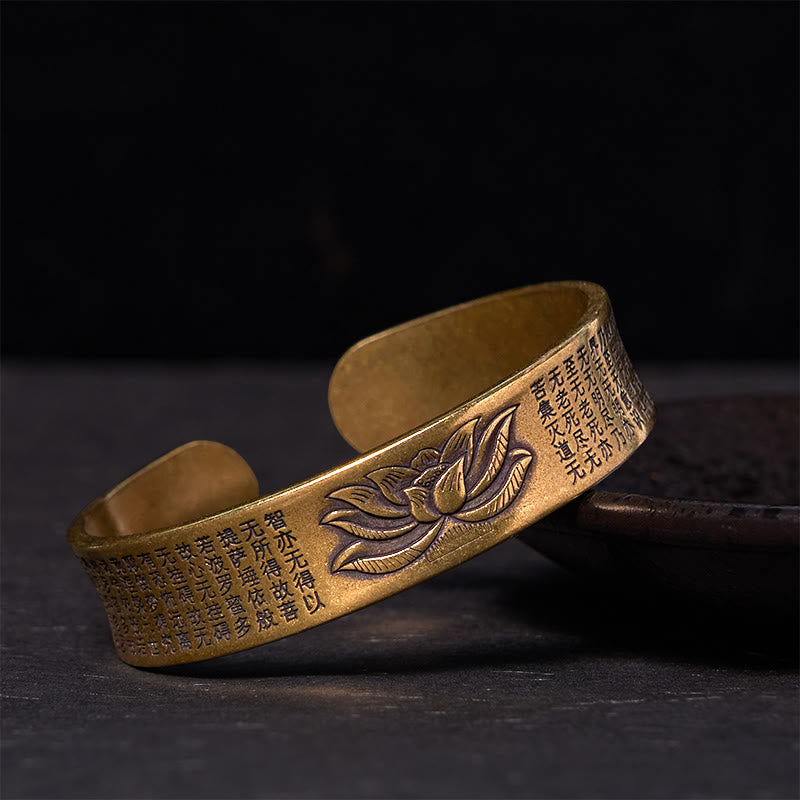 Heart Sutra Lotus Copper Brass Peace Cuff Bracelet – lotus relief with scripture on dark backdrop, zen harmony
