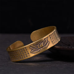 Heart Sutra Lotus Copper Brass Peace Cuff Bracelet – lotus relief with scripture on dark backdrop, zen harmony