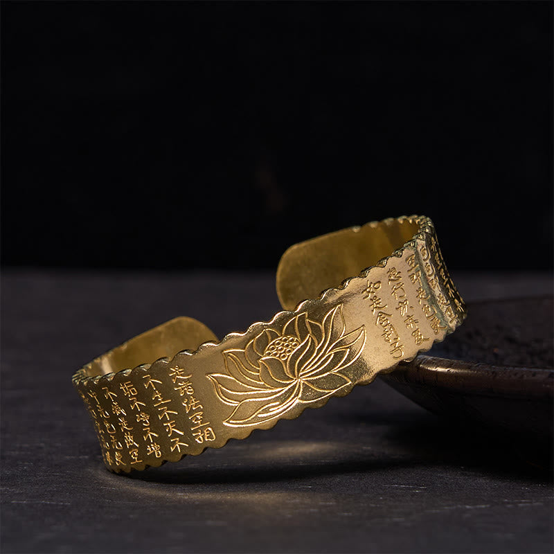 Heart Sutra Lotus Copper Cuff Bracelet – scalloped cuff with lotus and sutra characters, dark stone, Eastern spirituality
