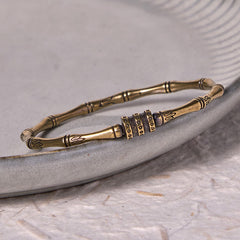 Bamboo Lotus Copper Brass Bracelet Bangle – open bamboo cuff with adjustable beads on gray ceramic, vintage brass, bohemian