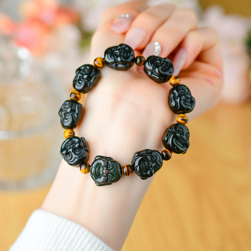 Rainbow Obsidian Laughing Buddha Bracelet – Front view of polished black beads with smiling Buddha charm