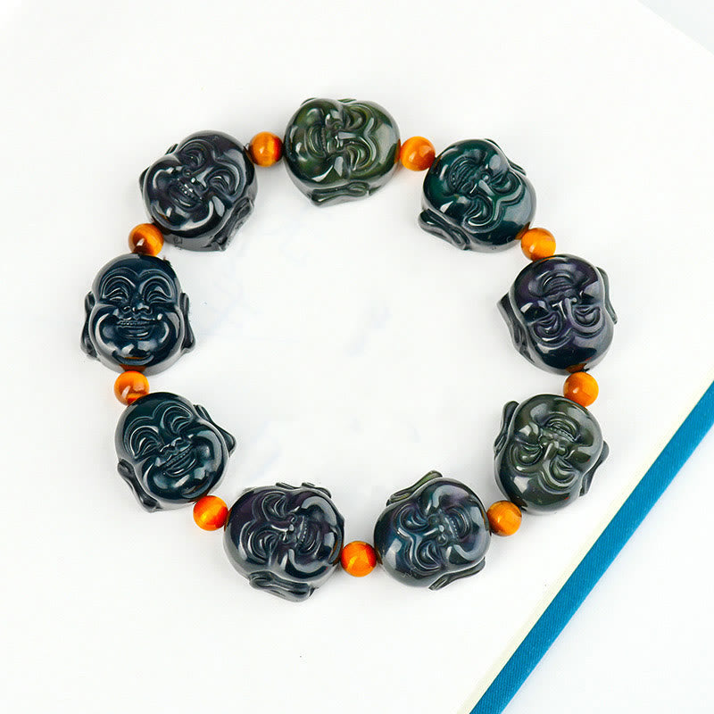 Rainbow Obsidian Laughing Buddha Bracelet – Flat lay on white marble, beaded bracelet styling, jewelry photo