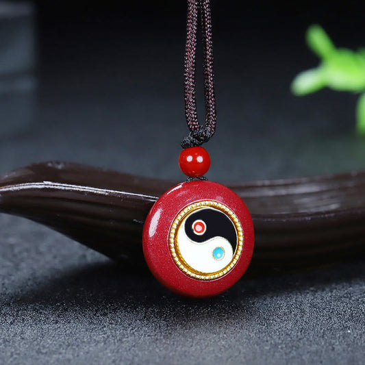 Cinnabar Yin Yang Necklace – red stone pendant with gold trim tai chi symbol, cinnabar jewelry