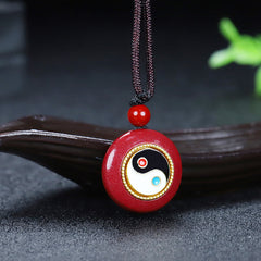 Cinnabar Yin Yang Necklace – red stone pendant with gold trim tai chi symbol, cinnabar jewelry