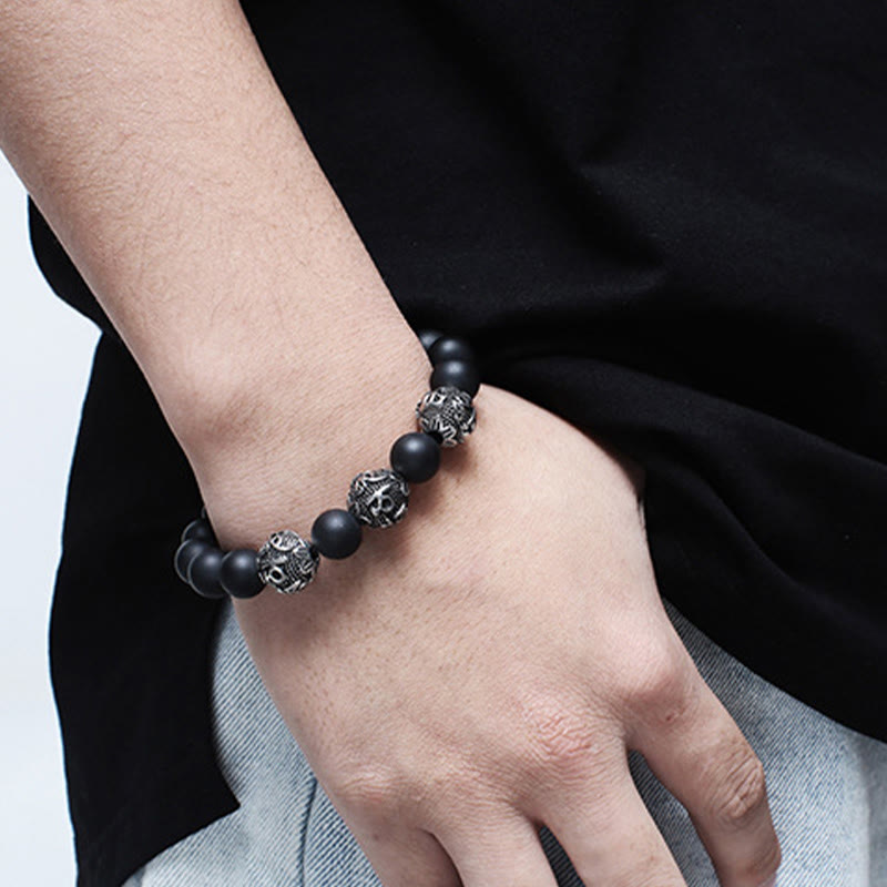 Tiger Eye Lava Rock Obsidian Om Mani Padme Hum Bracelet – obsidian wrist shot casual, confident guard
