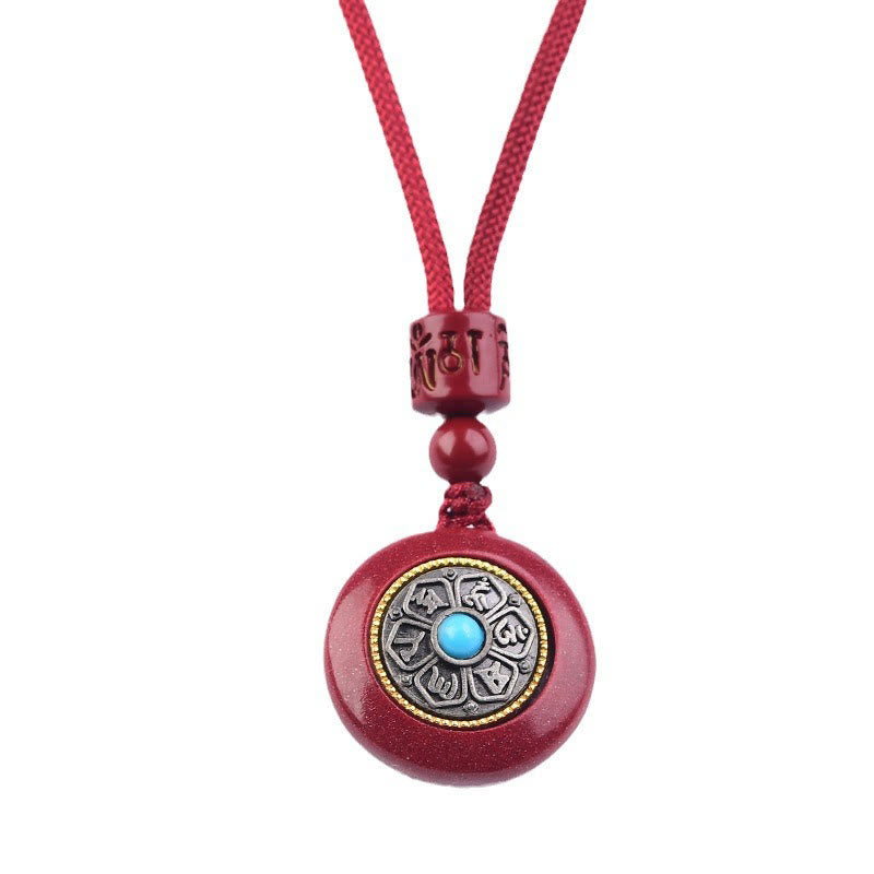 Natural Cinnabar Om Mani Padme Hum Pendant – Clean white background view with metal mandala inlay, cinnabar jewelry