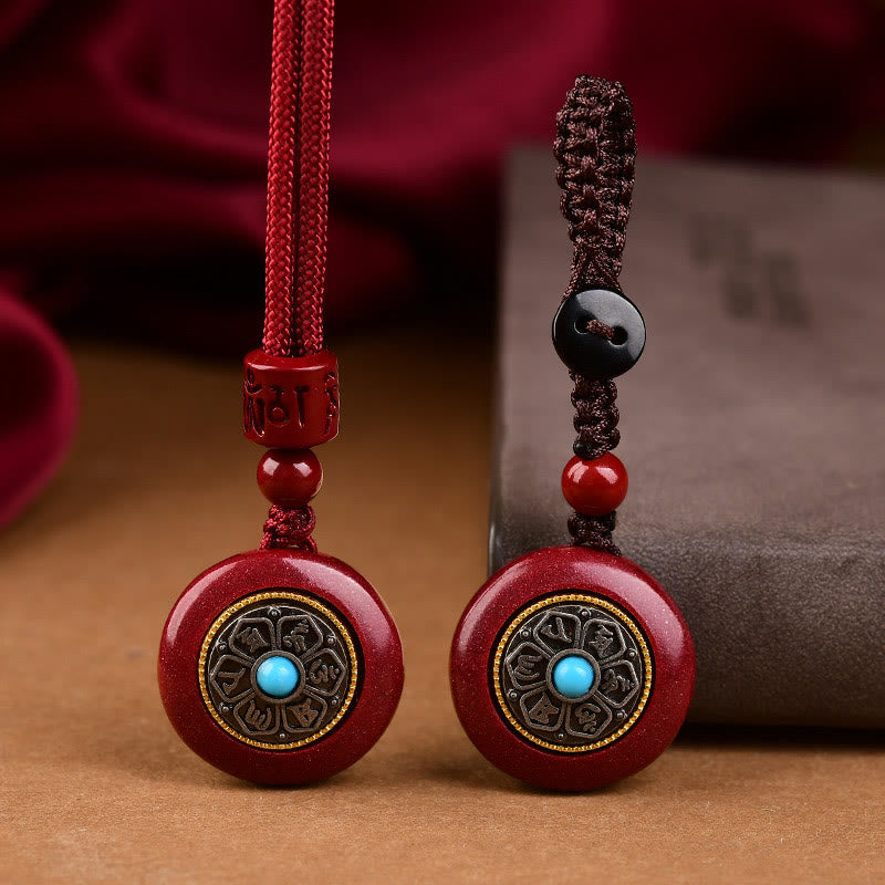 Natural Cinnabar Om Mani Padme Hum Pendant – Dual cord options with red and dark braided strings, protection amulet