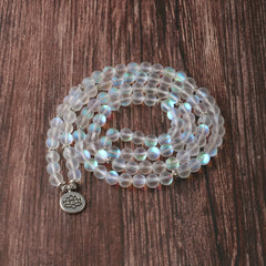 108 Mala Glitter Stone Lotus Bracelet – triple strand iridescent beads on dark wood, spiritual