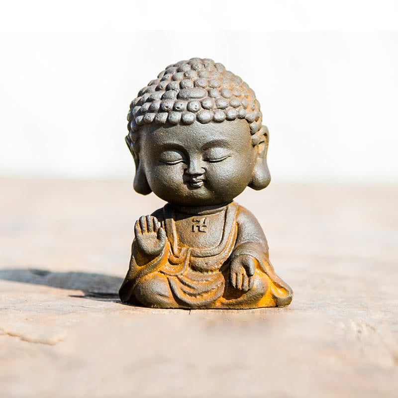 Meditating Buddha Statue – Angled top view showing head ushnisha and earlobes, traditional iconography