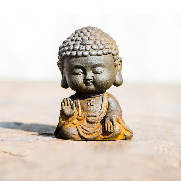 Meditating Buddha Statue – Angled top view showing head ushnisha and earlobes, traditional iconography