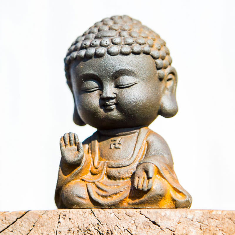 Meditating Buddha Statue – Single figurine on wooden surface, minimalist zen styling, modern spiritual home