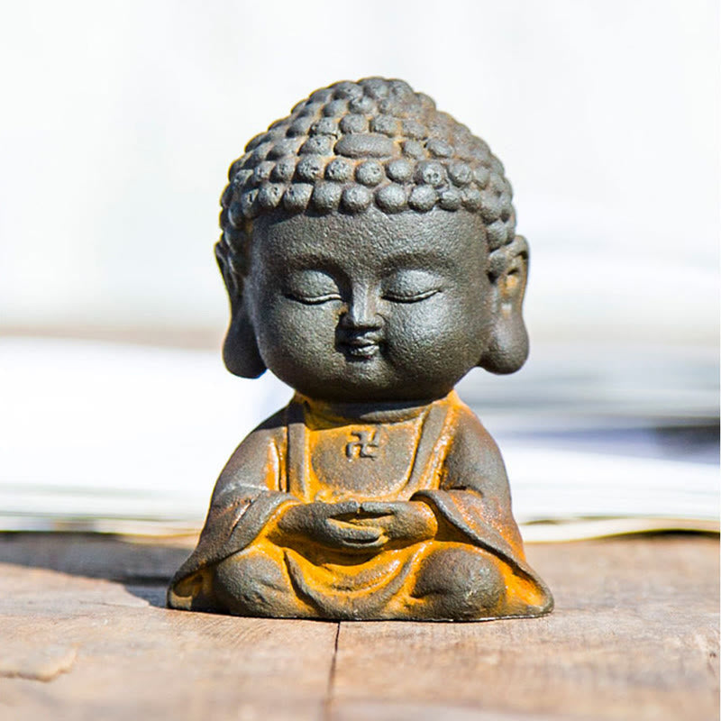 Meditating Buddha Statue – Size comparison with hand, compact 9cm figurine, desk meditation decor