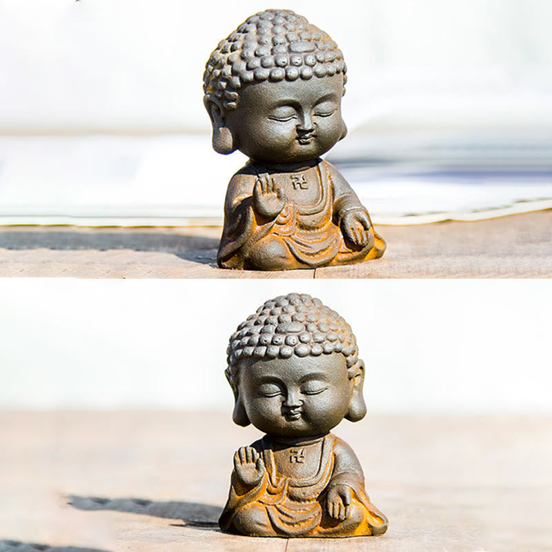 Meditating Buddha Statue – Lifestyle scene on meditation cushion with candles, serene shrine setup