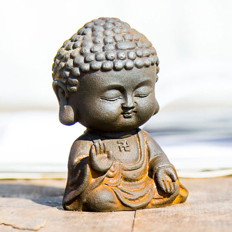 Meditating Buddha Statue – Under warm lighting, golden brown iron powder glow, ambient spiritual decor