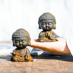 Meditating Buddha Statue – Back view highlighting detailed carving and smooth resin surface, meditation altar