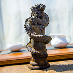 Flying Dragon Pillar Resin Statue – low-angle side view of coiled dragon on wooden table with teaware, feng shui fortune