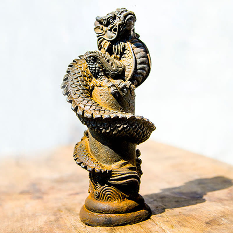 Flying Dragon Pillar Resin Statue – three-quarter low view on warm wood surface with bright backlight, fortune piece