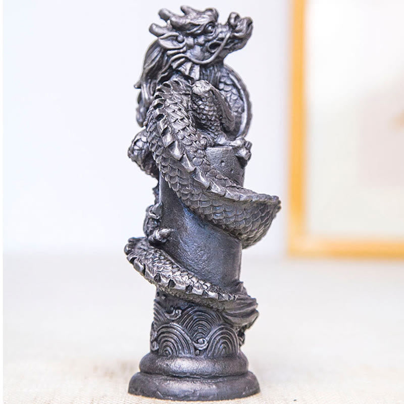 Flying Dragon Pillar Resin Statue – three-quarter angle with gold picture frame backdrop, wave base, fortune