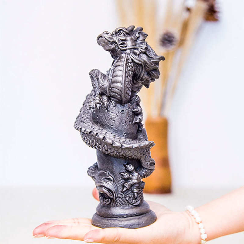 Flying Dragon Pillar Resin Statue – hand-held showing pearl bracelet and tabletop size, metallic silver dragon