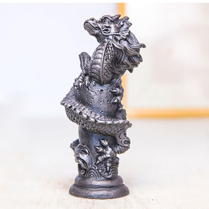 Flying Dragon Pillar Resin Statue – three-quarter view on light beige with wood accent, detailed dragon, strength