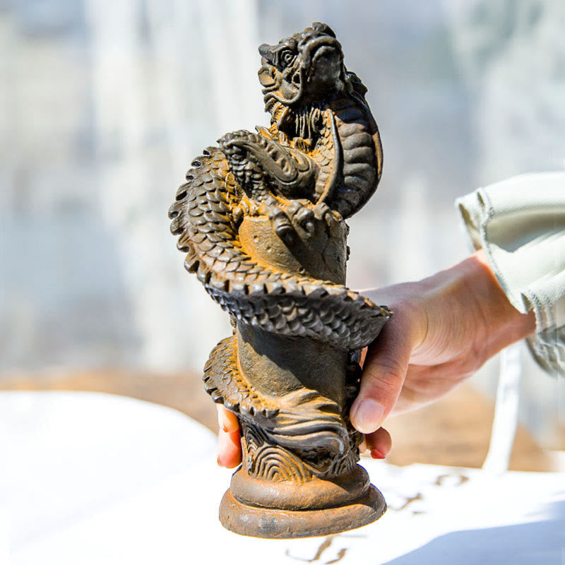 Flying Dragon Pillar Resin Statue – three-quarter view held by hand showing tabletop scale, protective fortune