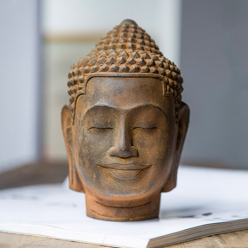 Meditating Buddha Head Resin Statue – closed eyes and gentle smile detail, inner peace expression