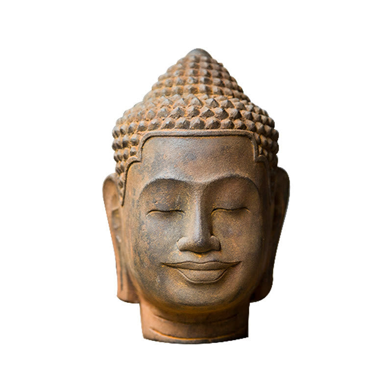 Meditating Buddha Head Resin Statue – comparison with book stack for scale, medium size reference