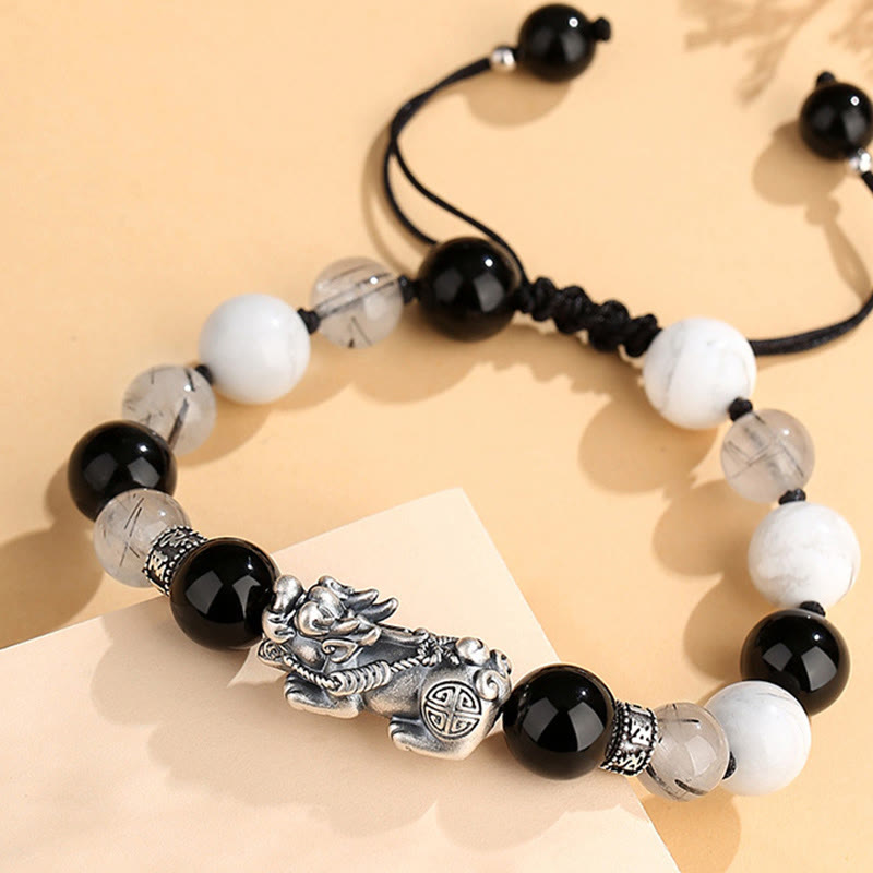 Black Obsidian Pi Xiu Bracelet – Close-up side angle, Pi Xiu carving detail, obsidian and quartz beads, good luck talisman